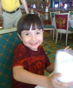 Sipping milk at our favorite restaurant aboard the Norwegian Jewel, Zsars Palace.